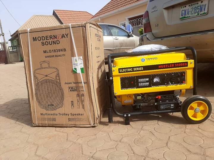 Donation: An Engraced Mother Gifts the Group A Generator Set and A Public Address System